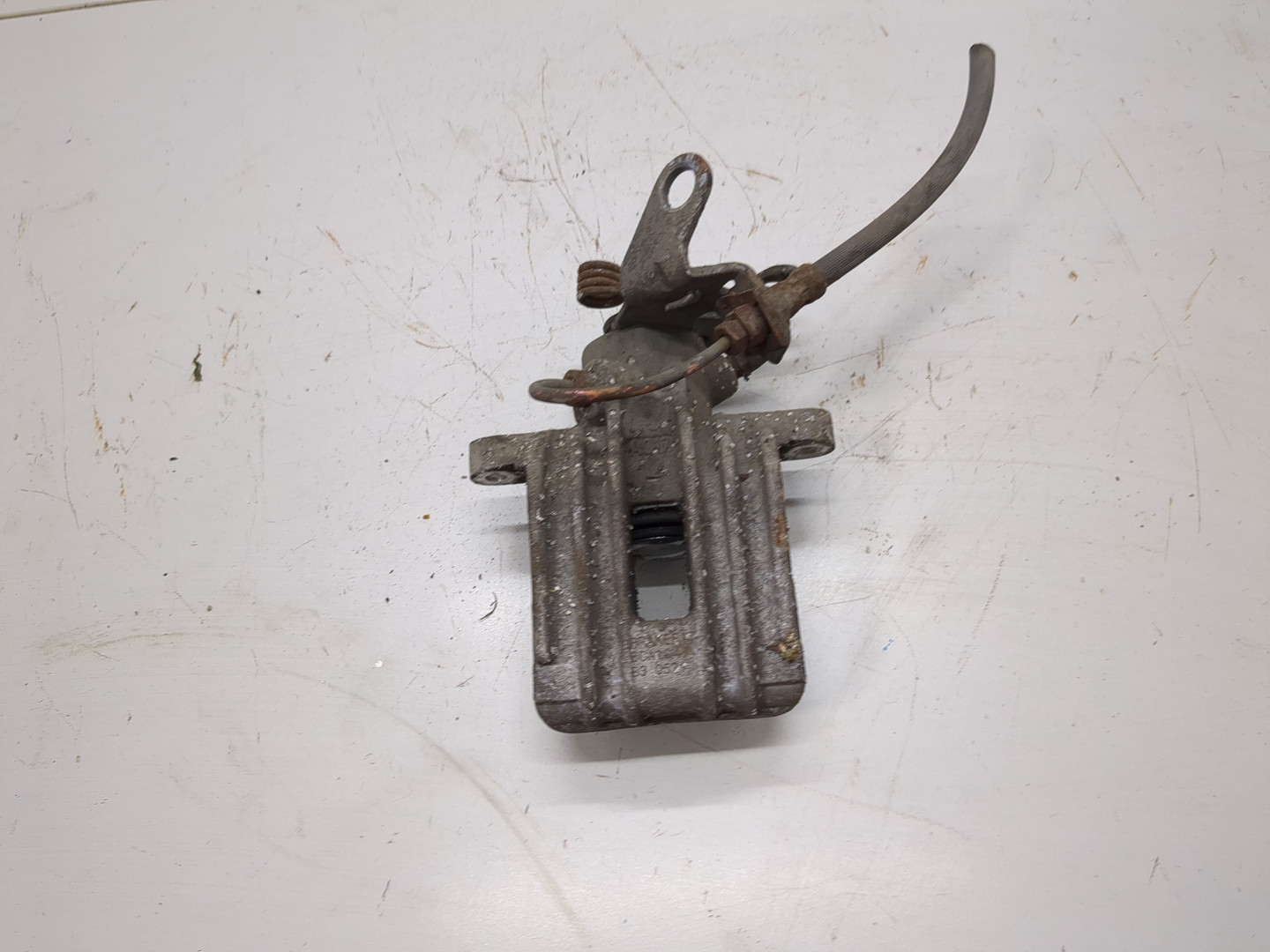 Суппорт задний левый