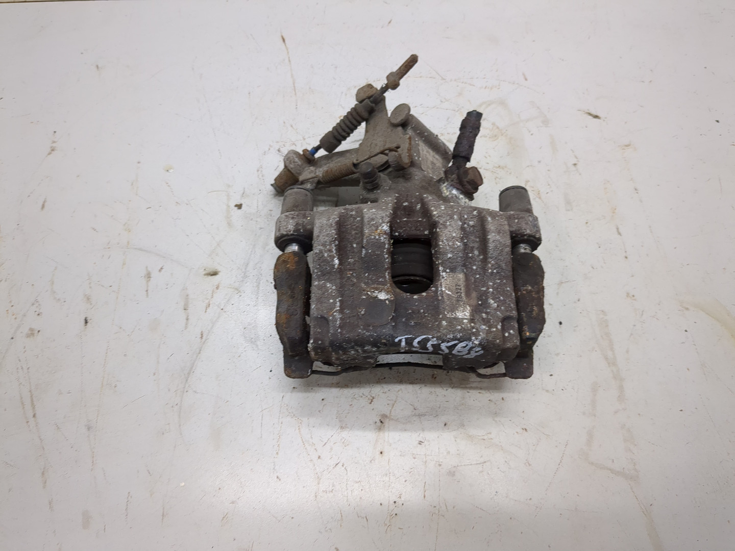 Суппорт задний левый