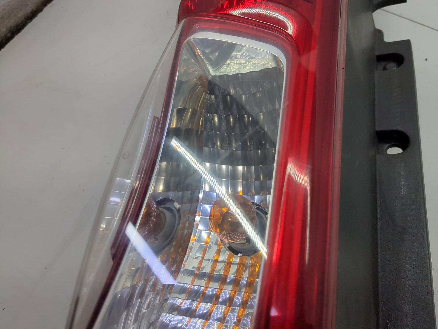 Фонарь задний левый