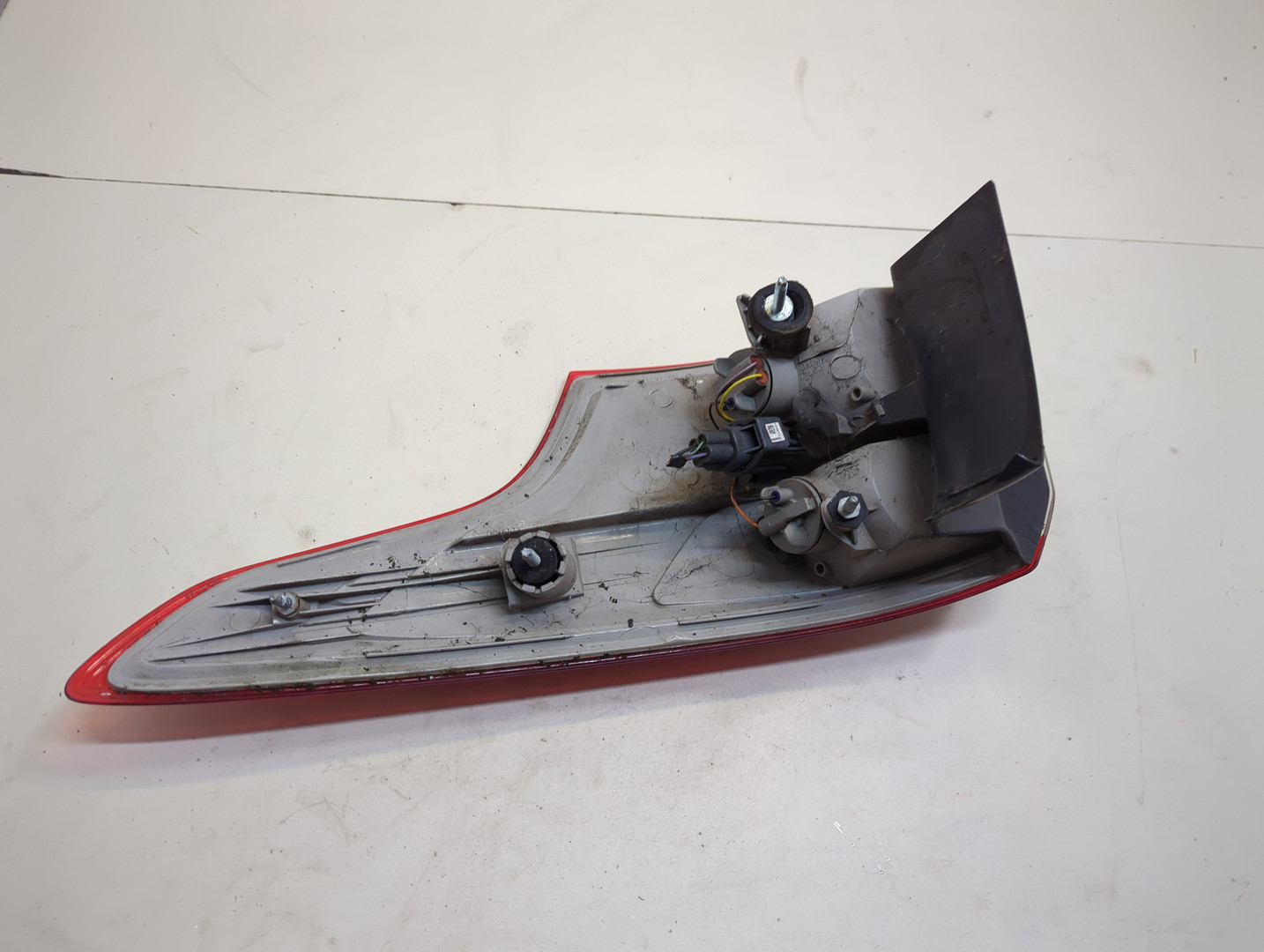 Фонарь задний левый