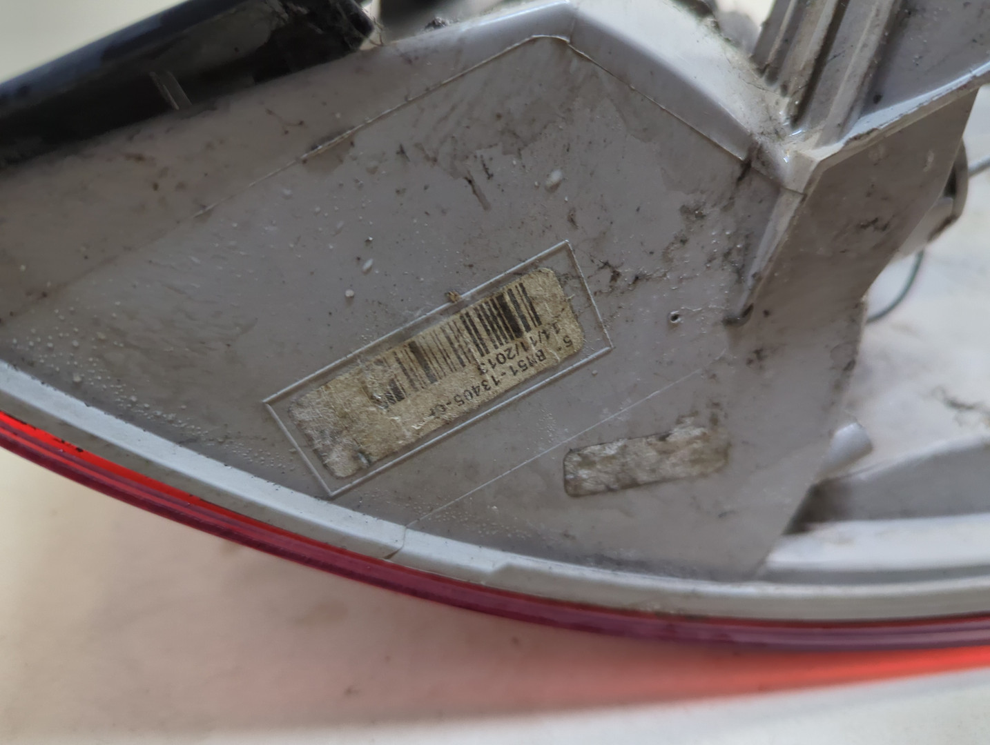 Фонарь задний левый