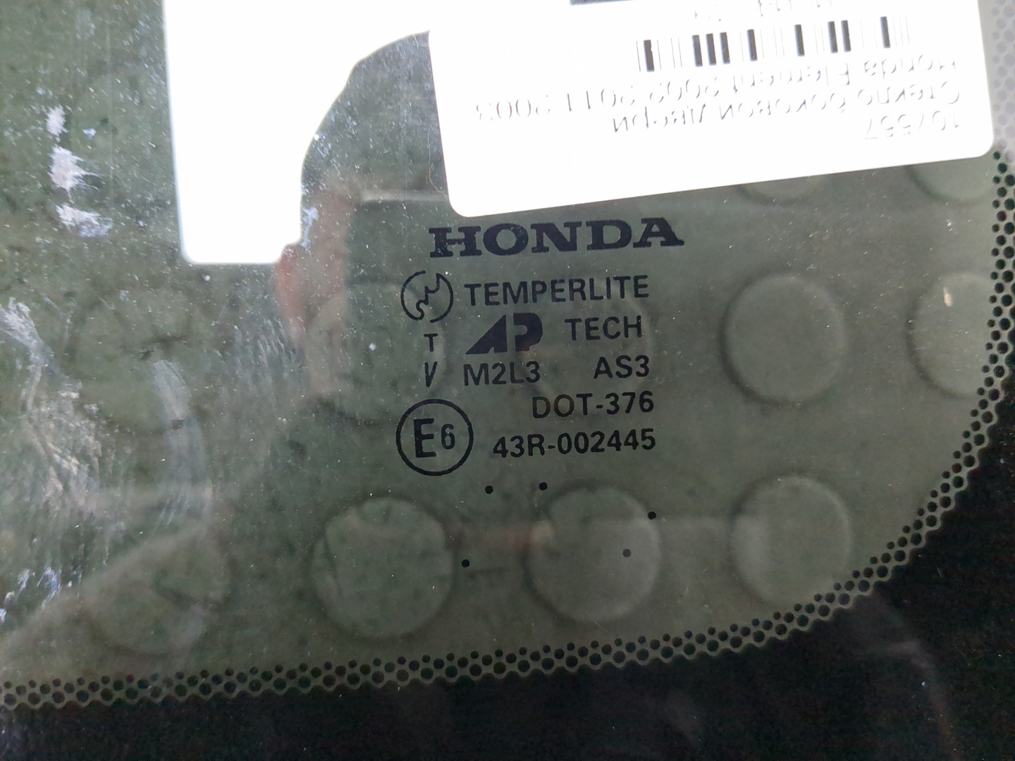 Стекло двери задней левой