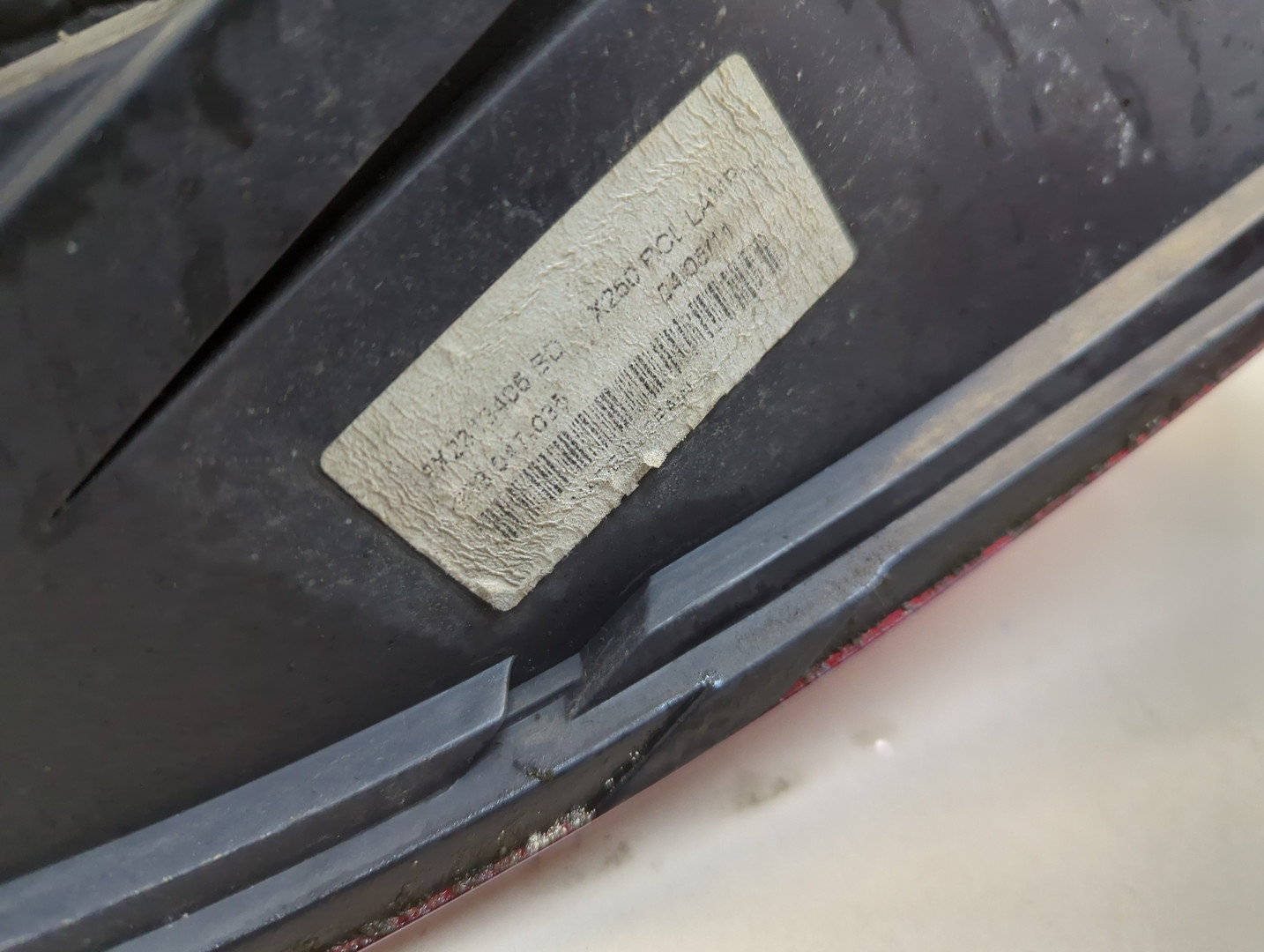 Фонарь задний левый