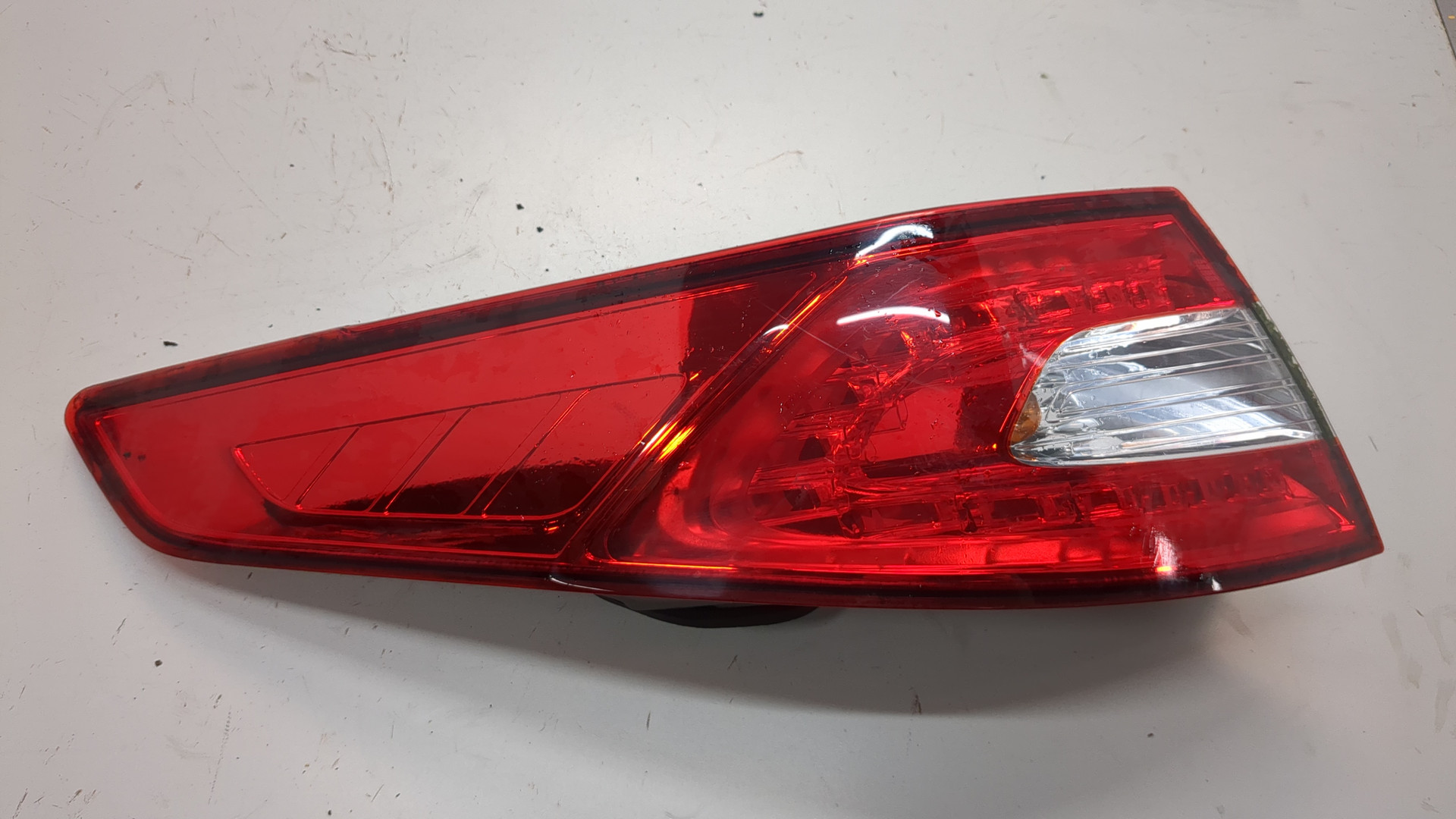 Фонарь задний левый