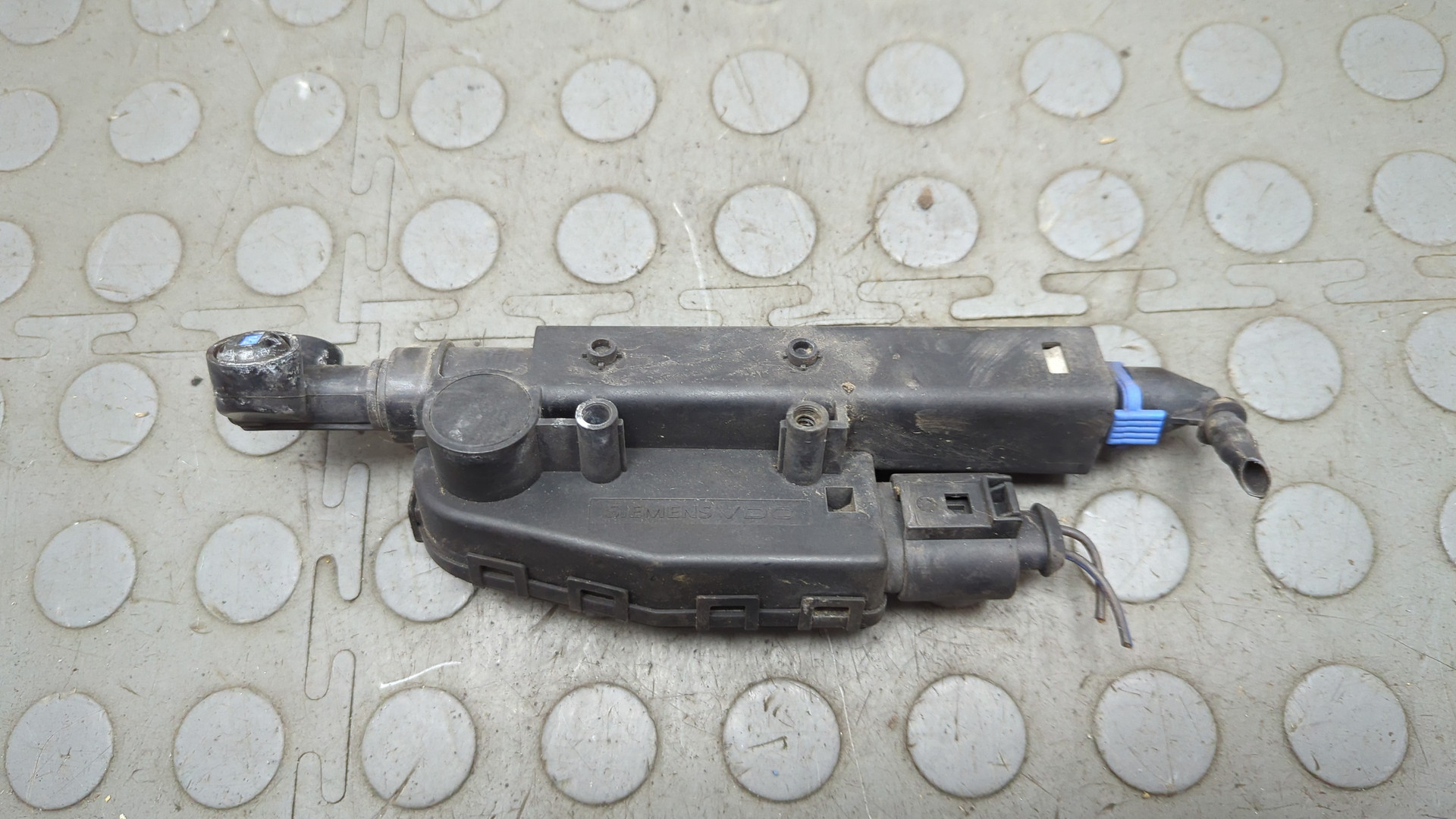 Форсунка омывателя фары