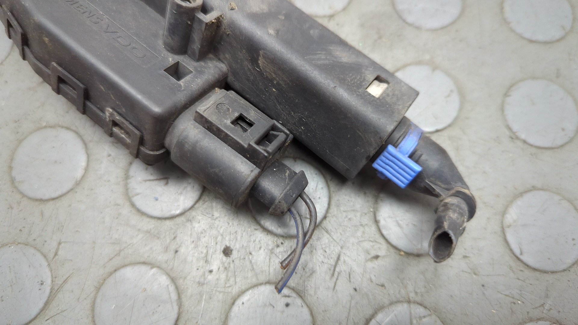 Форсунка омывателя фары