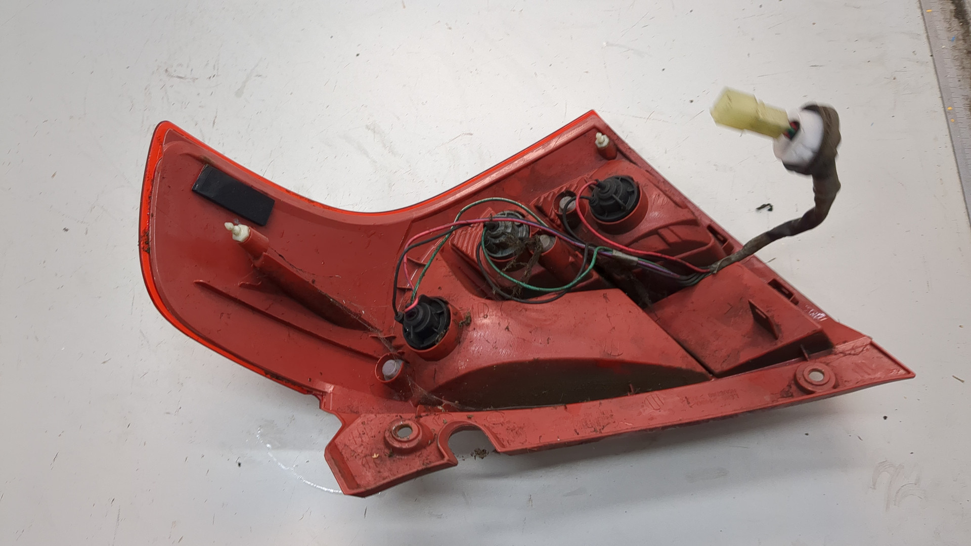 Фонарь задний левый