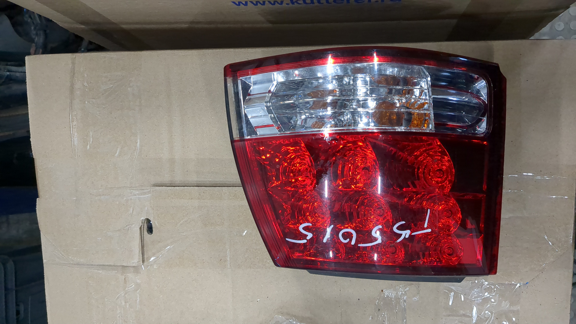 Фонарь задний левый