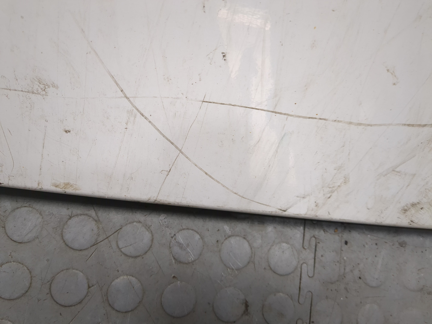 Спойлер переднего бампера левый