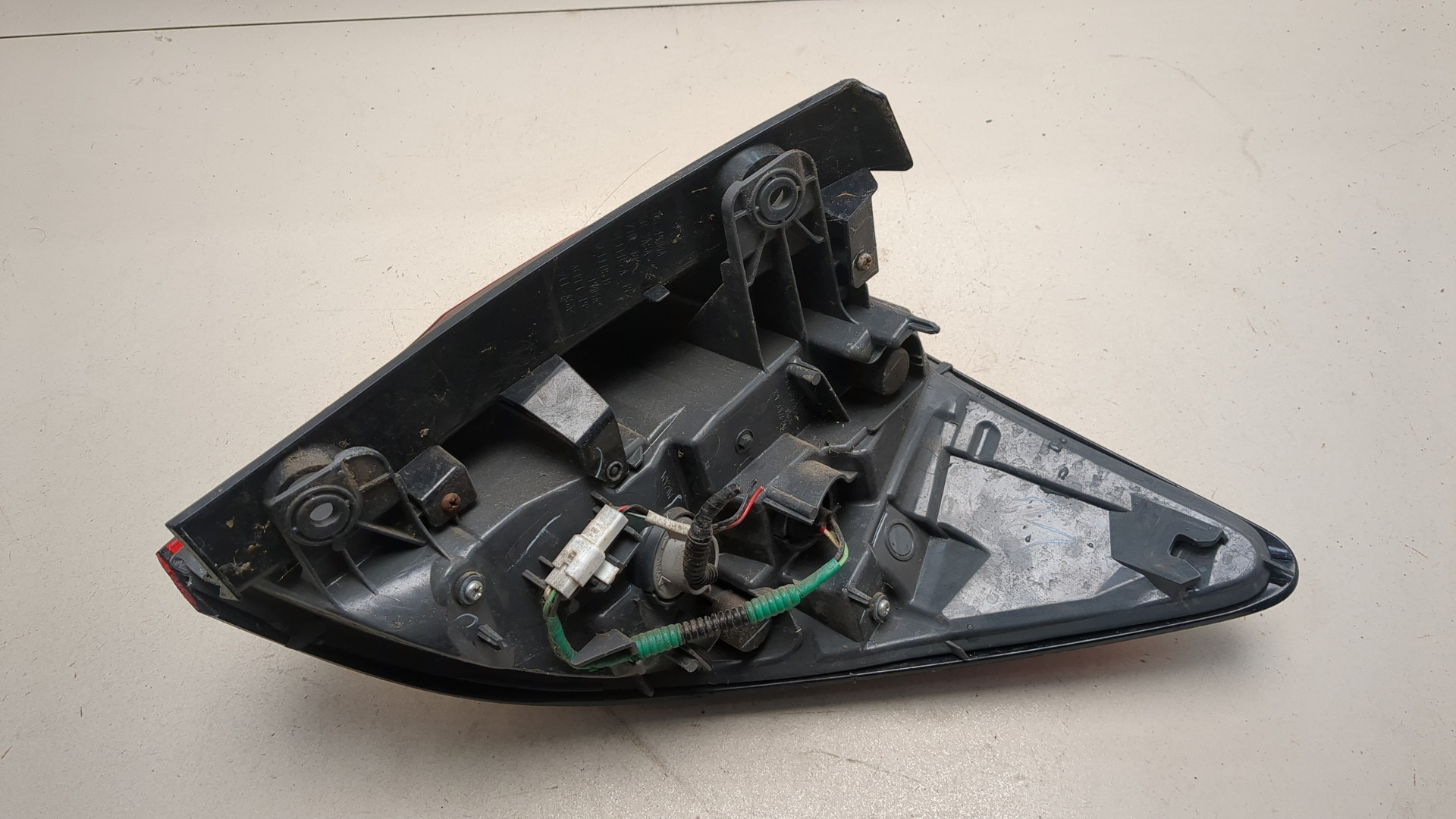 Фонарь задний левый