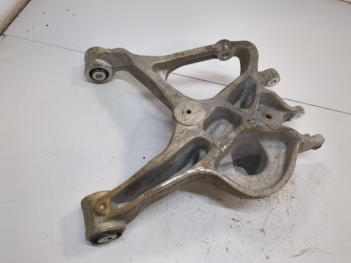 Рычаг задний левый