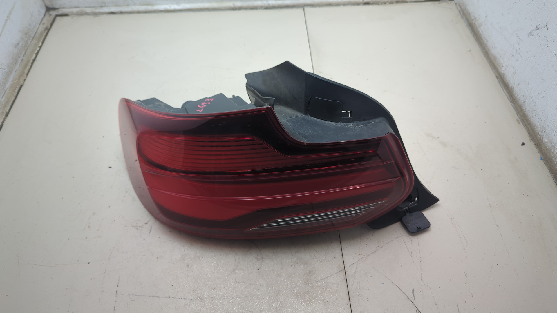 Фонарь задний левый