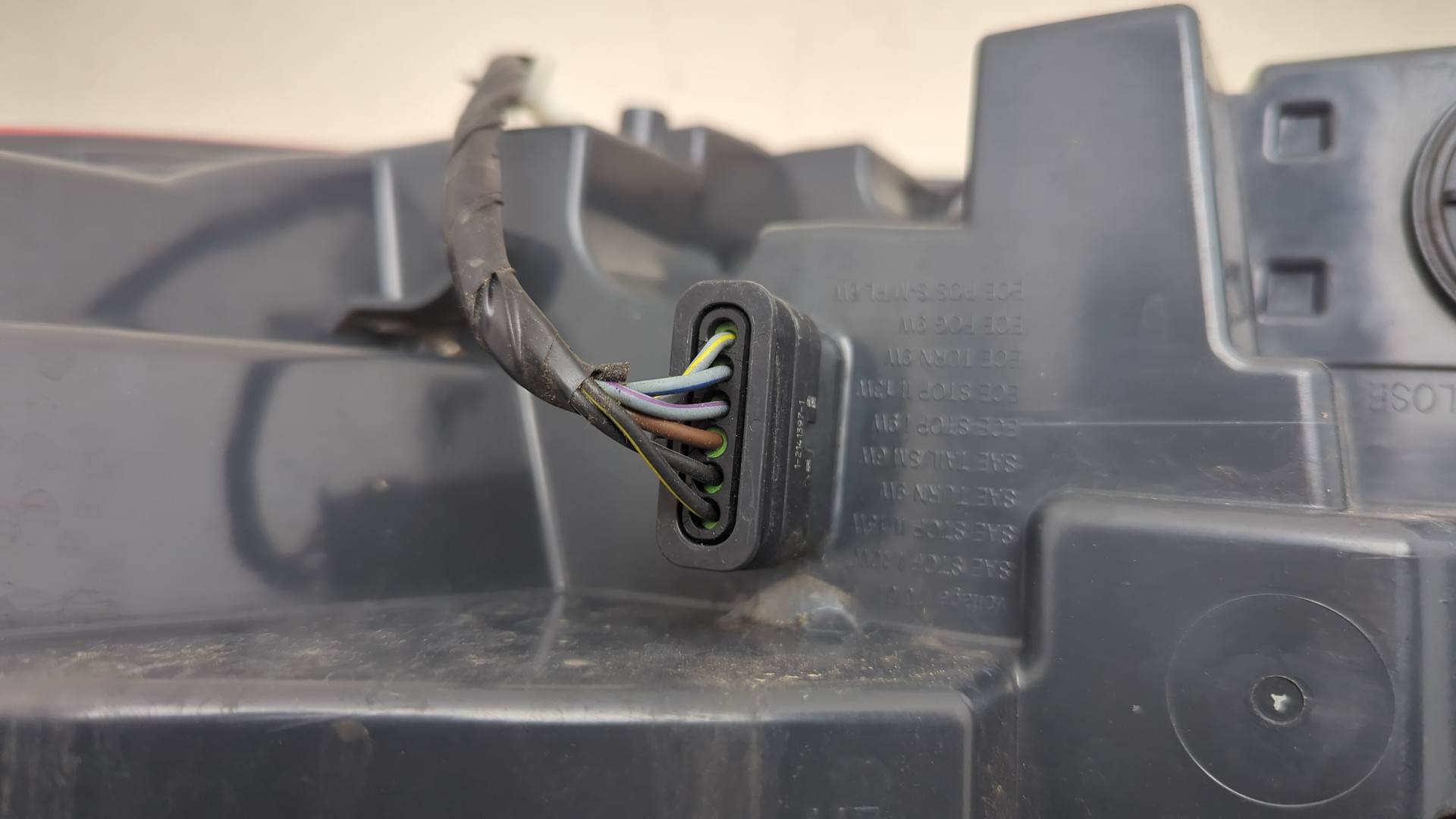 Фонарь задний левый