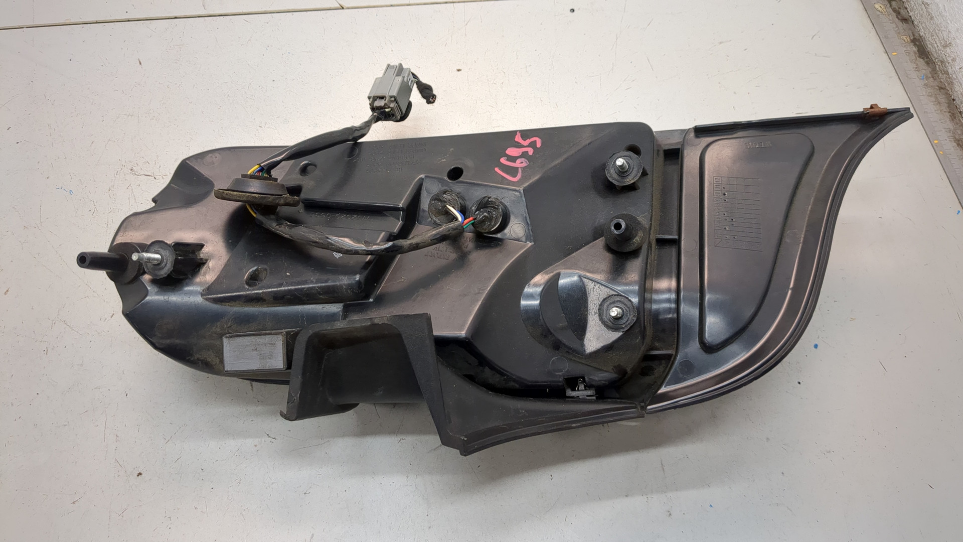 Фонарь задний левый