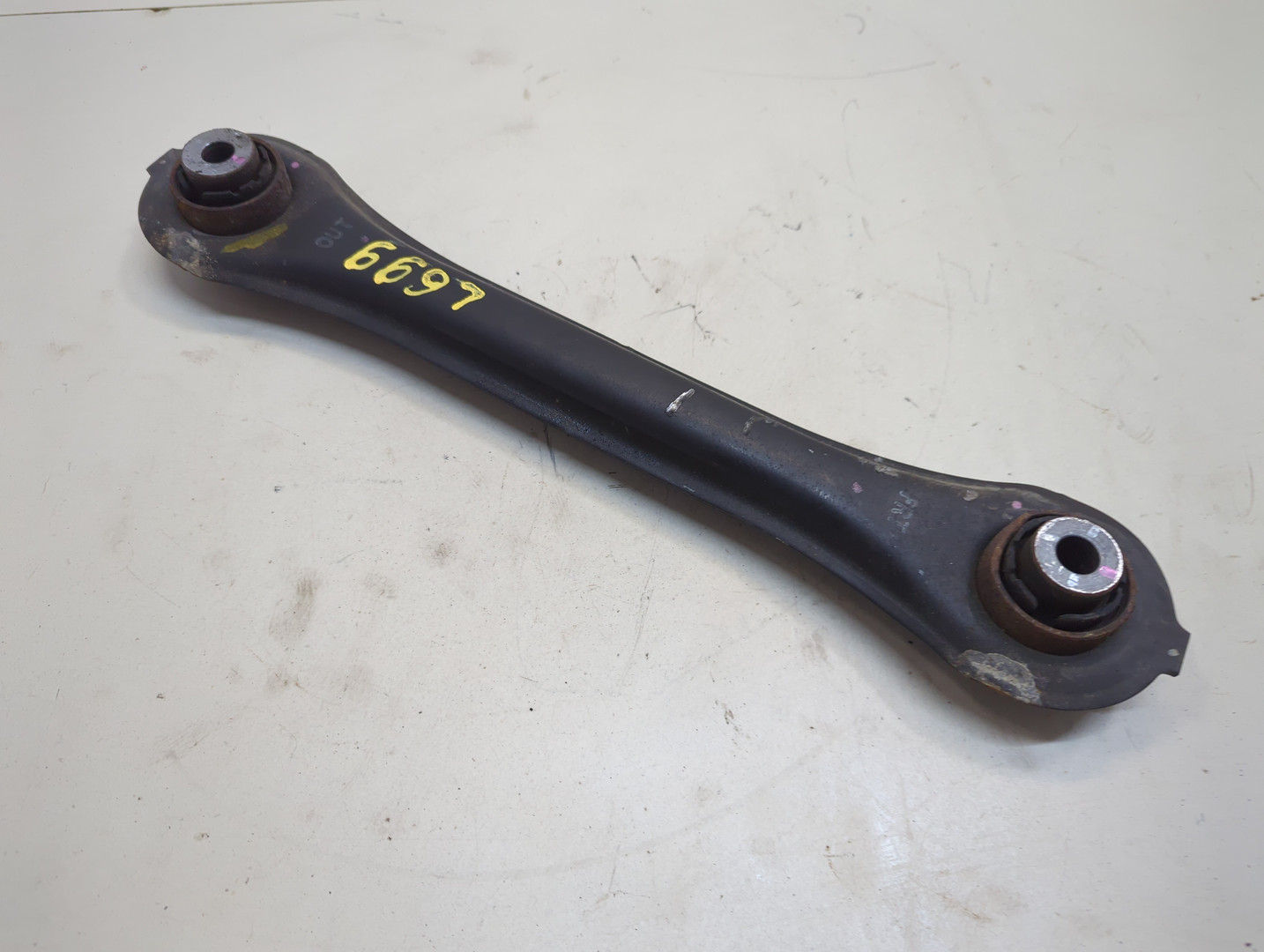 Рычаг задний