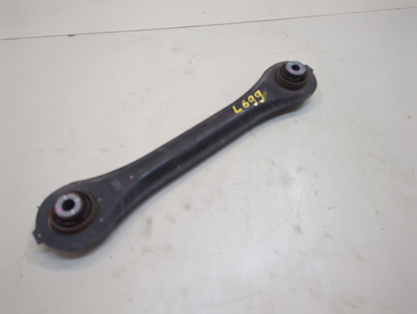 Рычаг задний