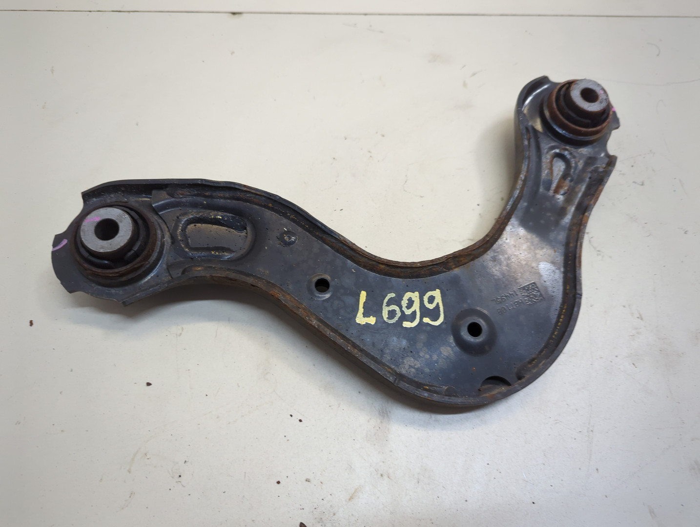 Рычаг задний левый