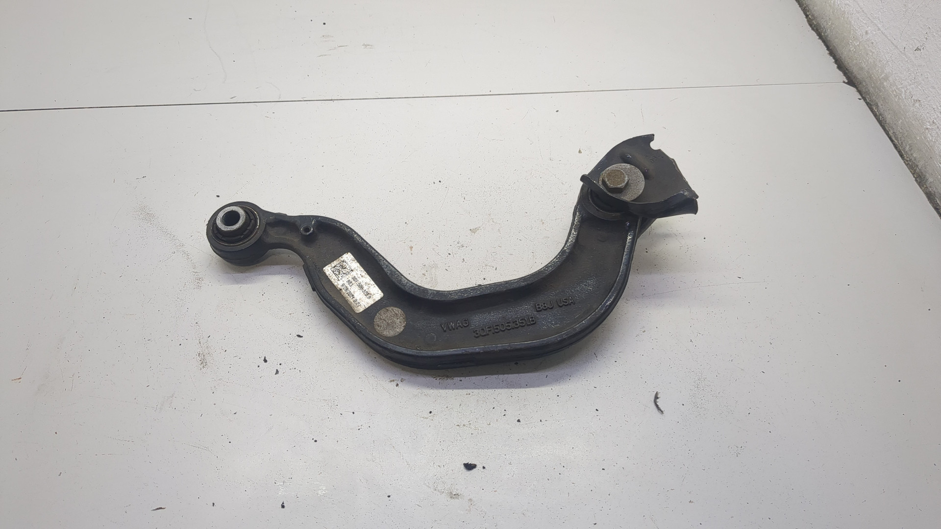 Рычаг задний левый