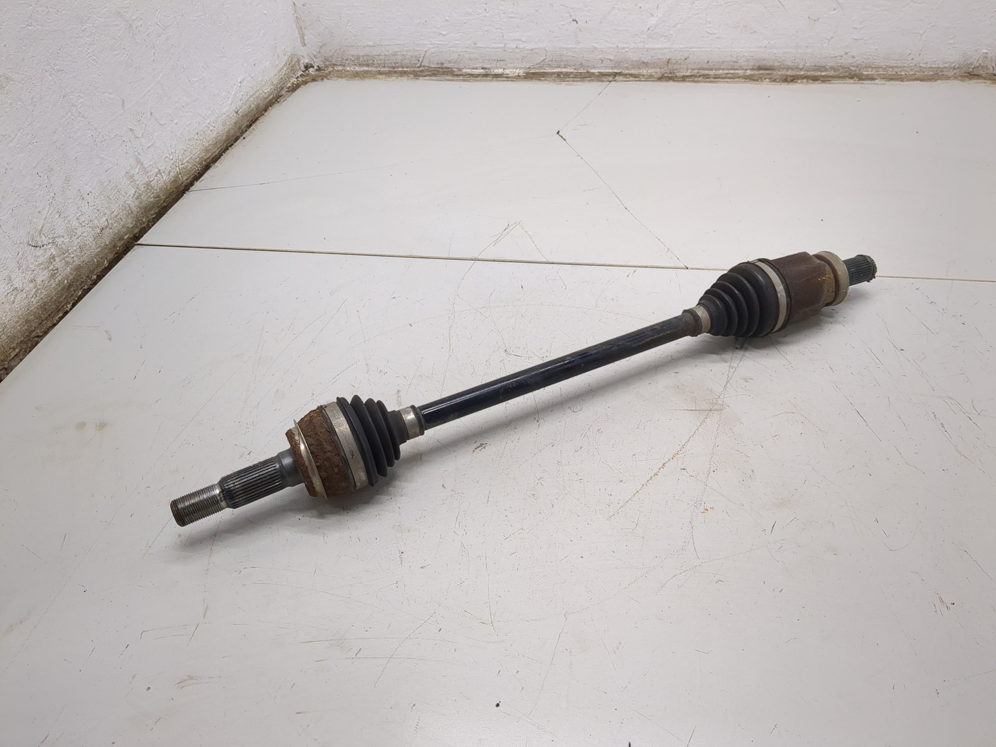 Полуось задняя левая