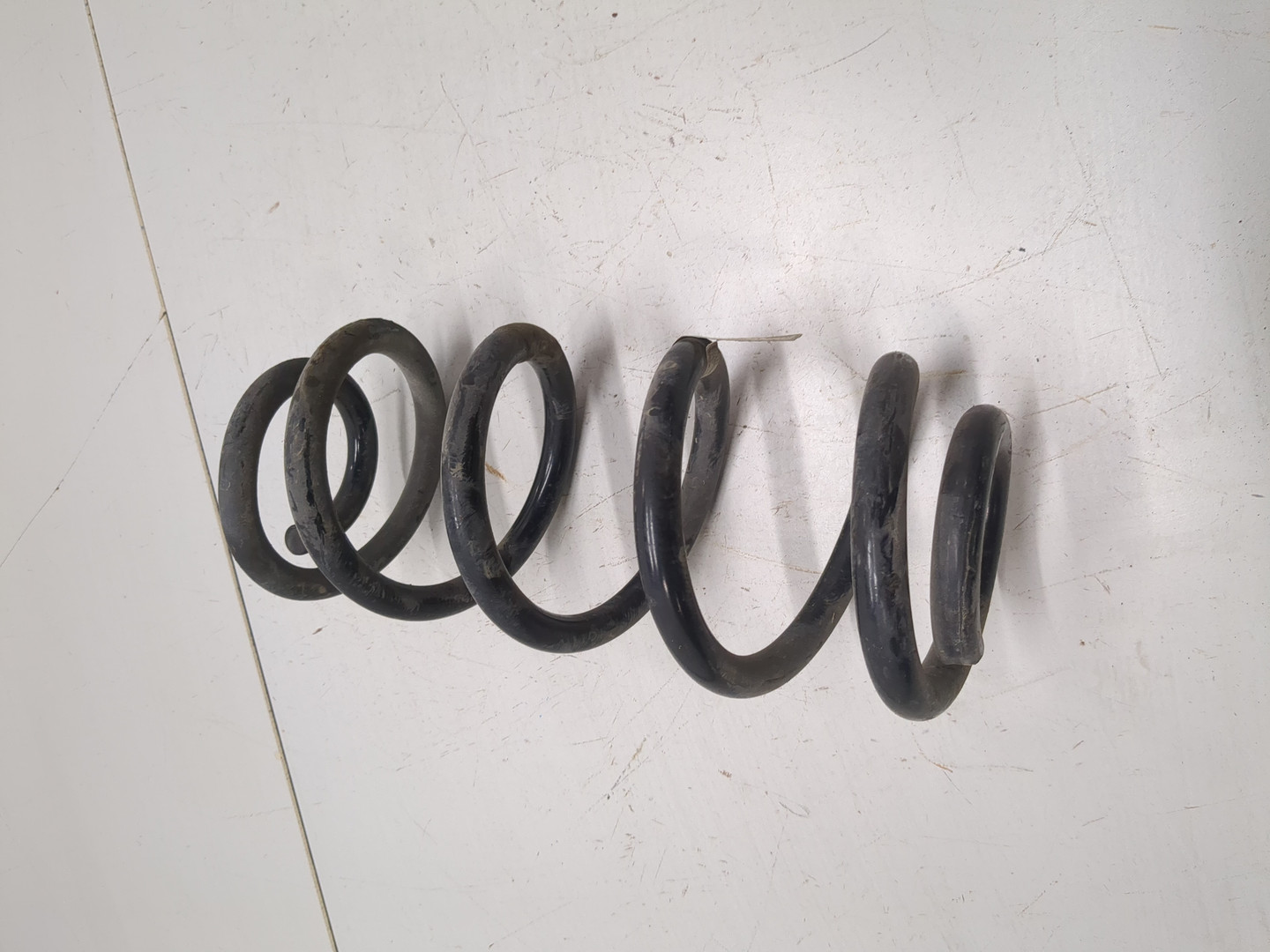 Пружина задняя