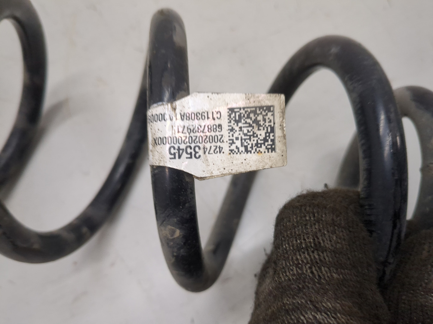 Пружина задняя