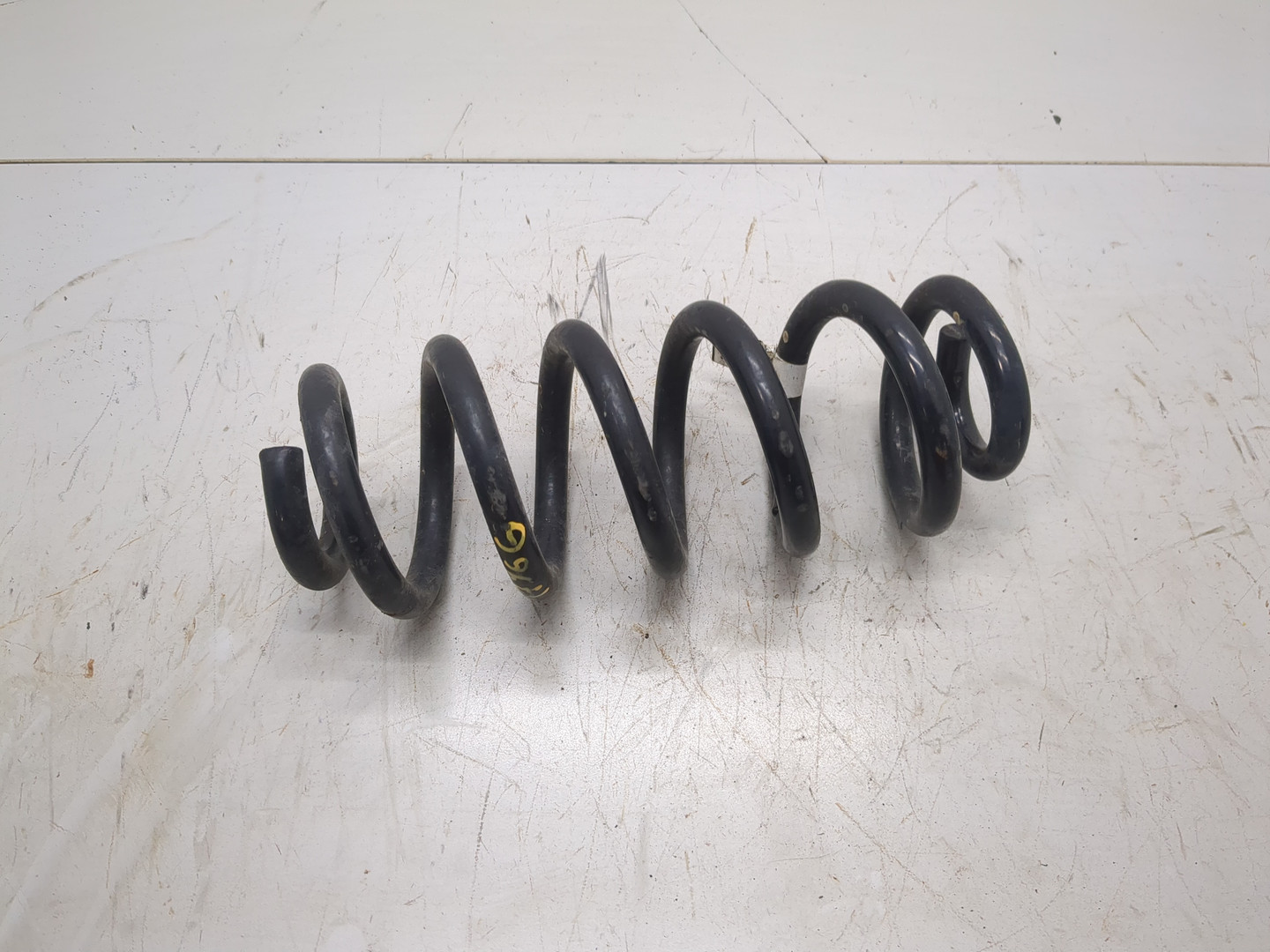 Пружина задняя