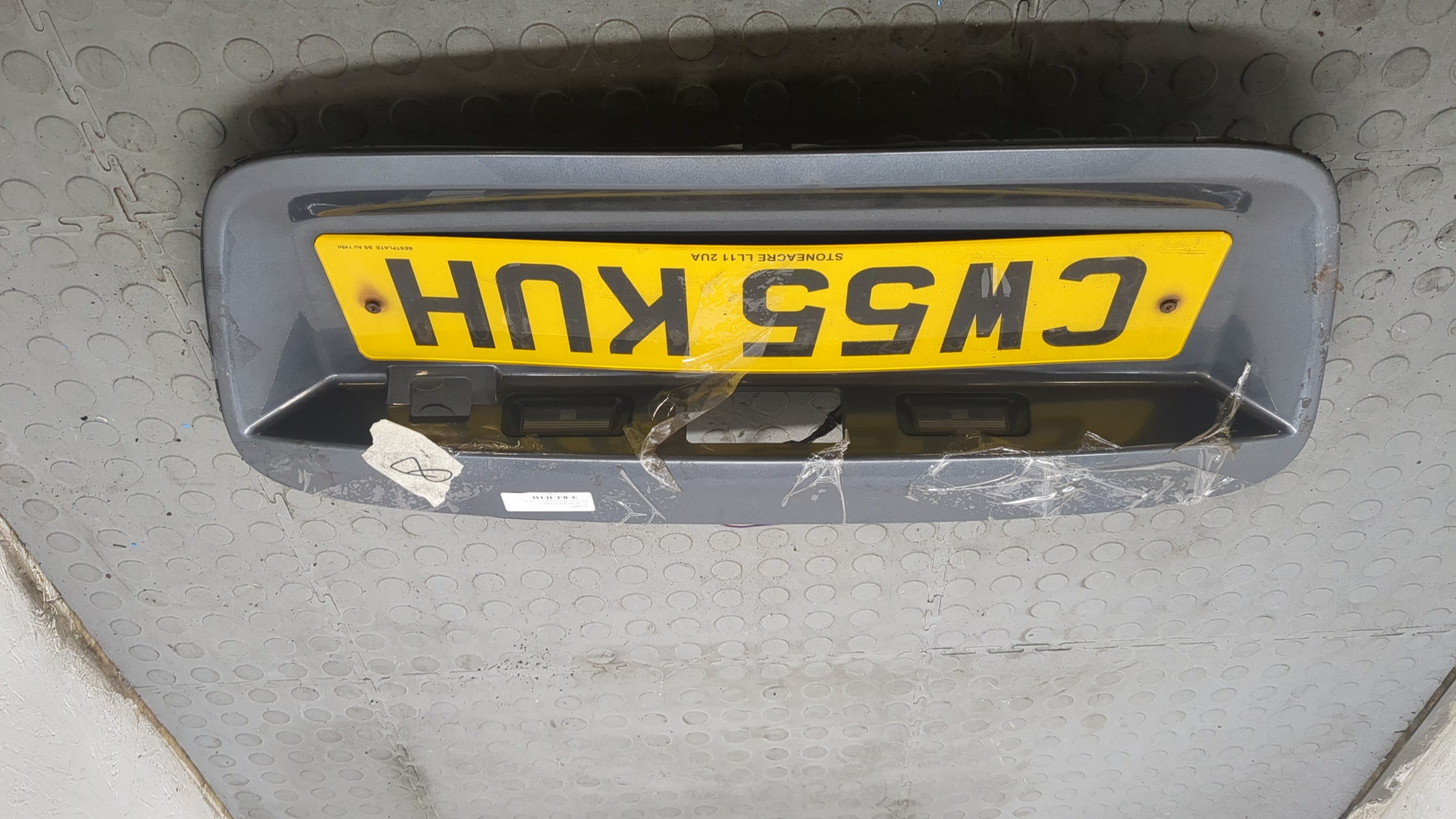 Фонарь подсветки номера