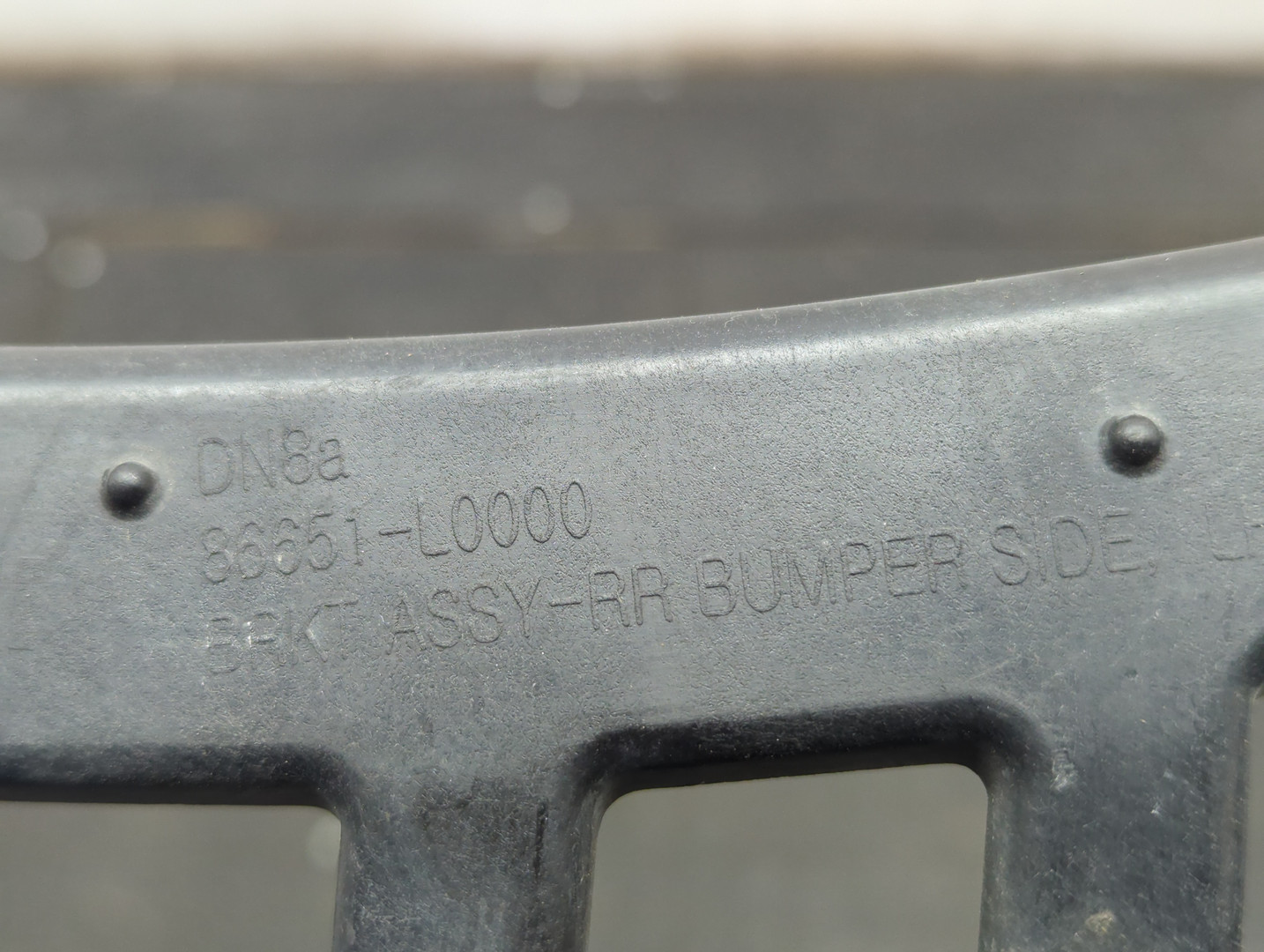 Кронштейн заднего бампера левый