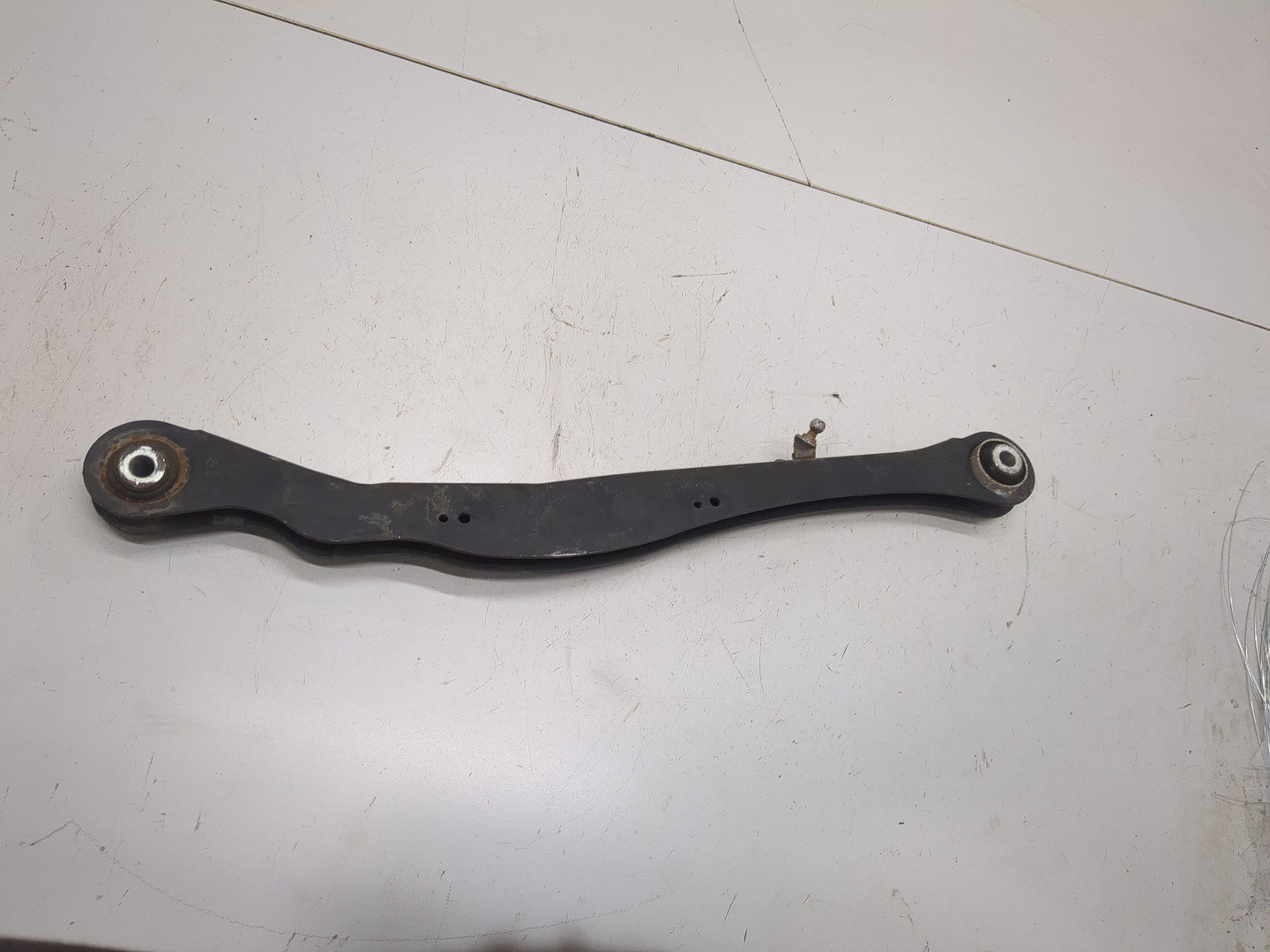 Рычаг задний левый