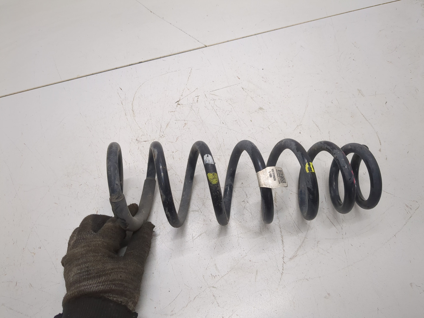 Пружина задняя