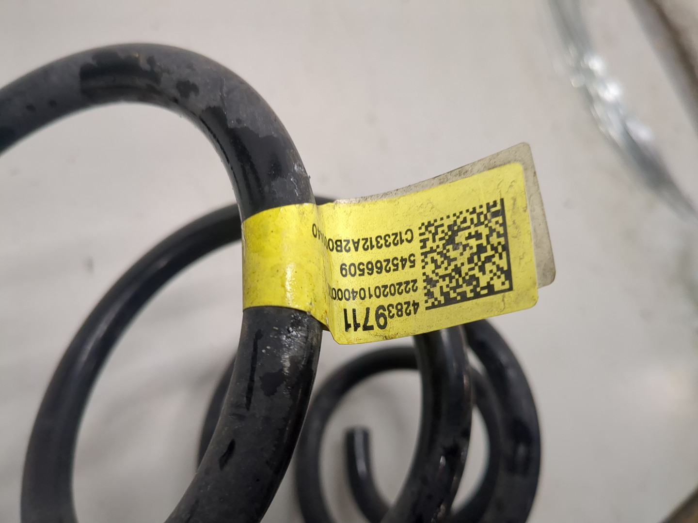 Пружина задняя