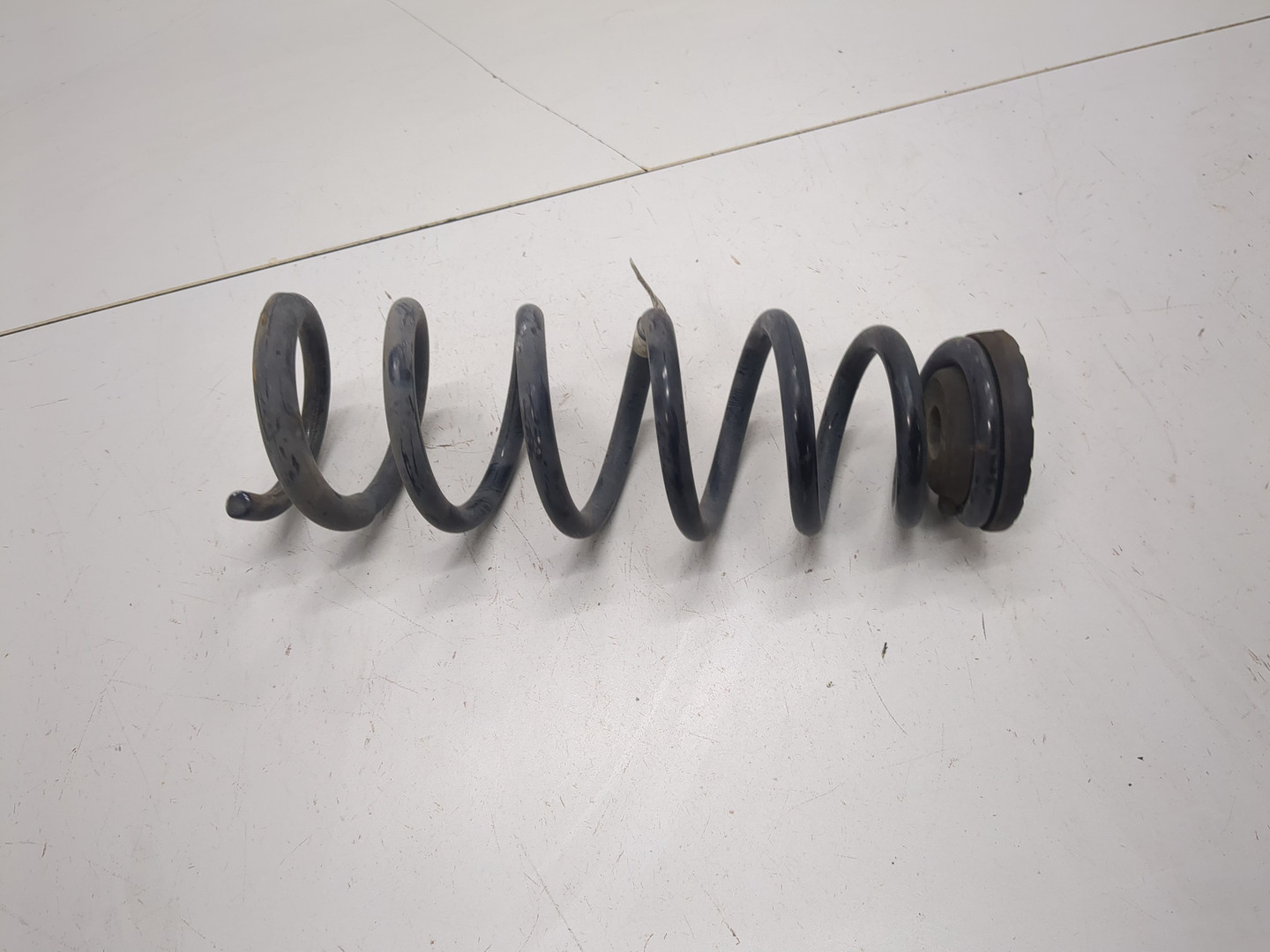 Пружина задняя