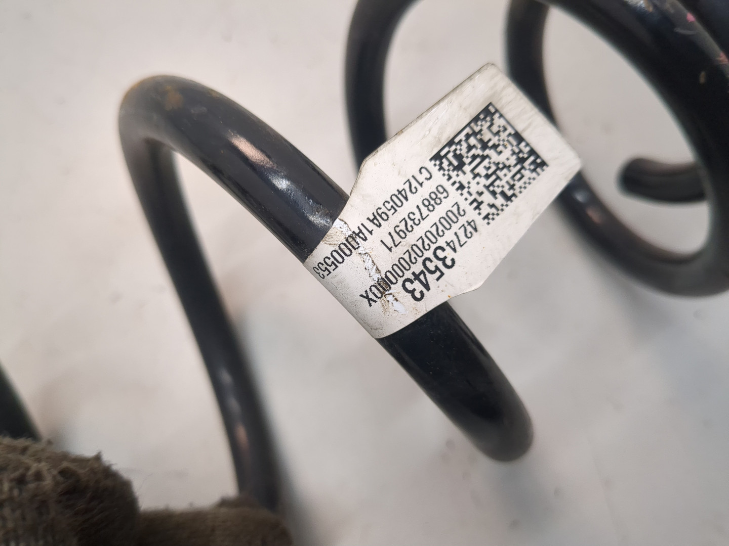 Пружина задняя