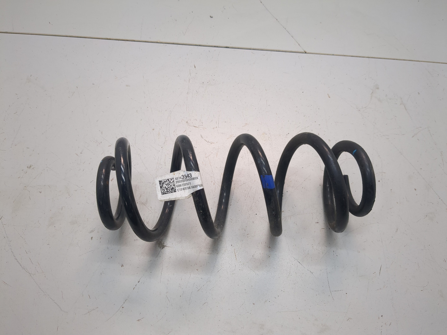 Пружина задняя