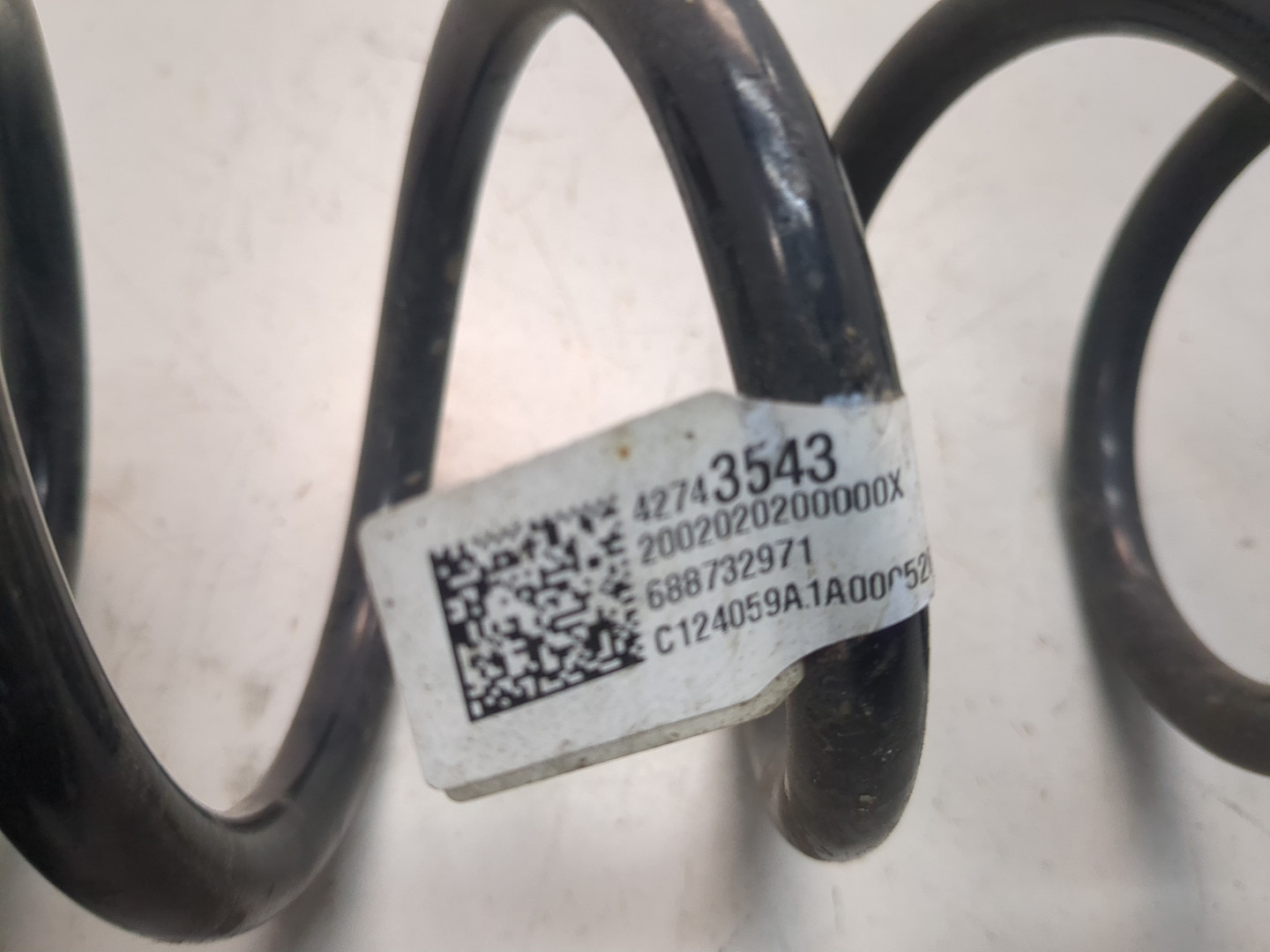 Пружина задняя