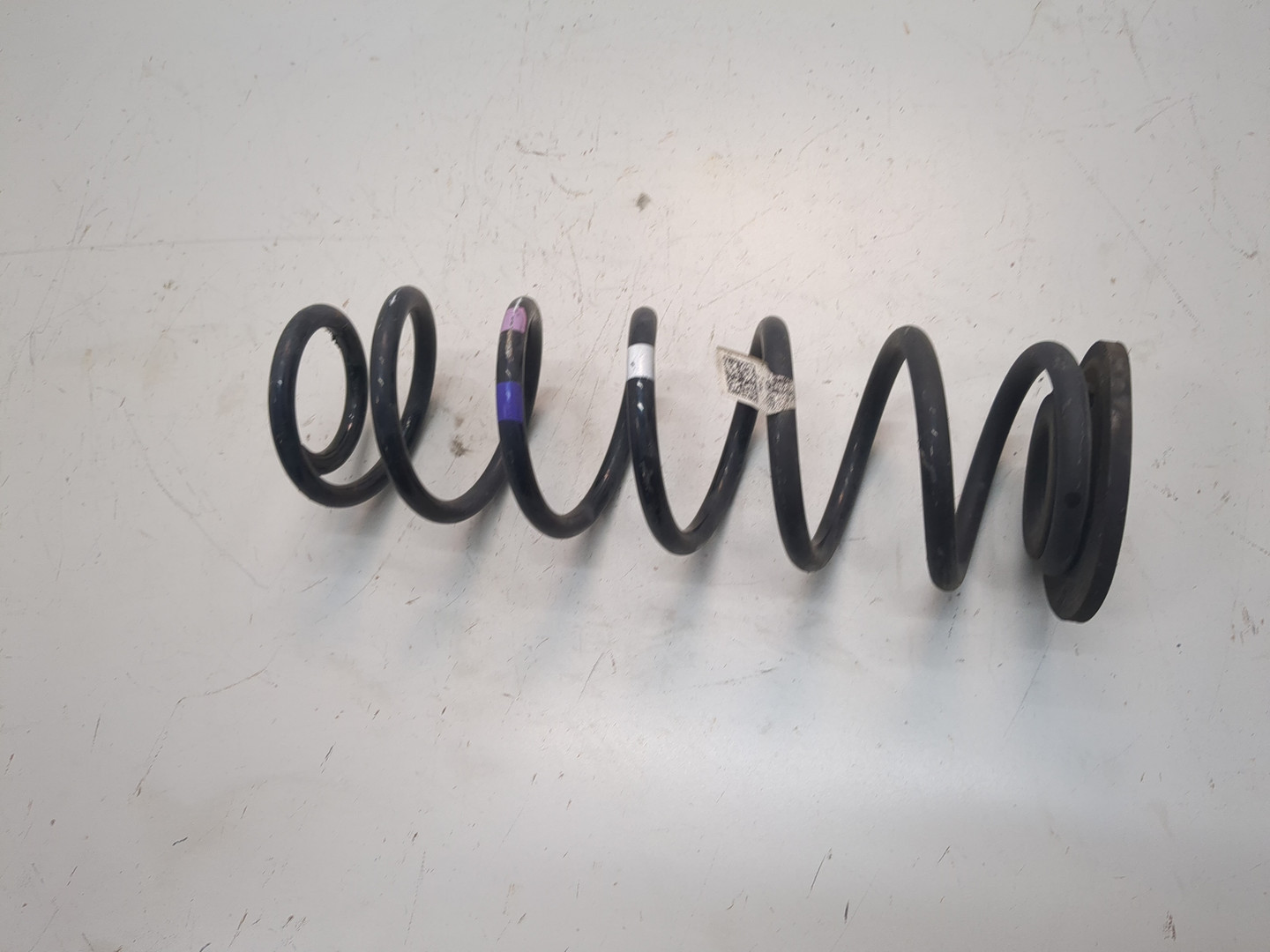 Пружина задняя