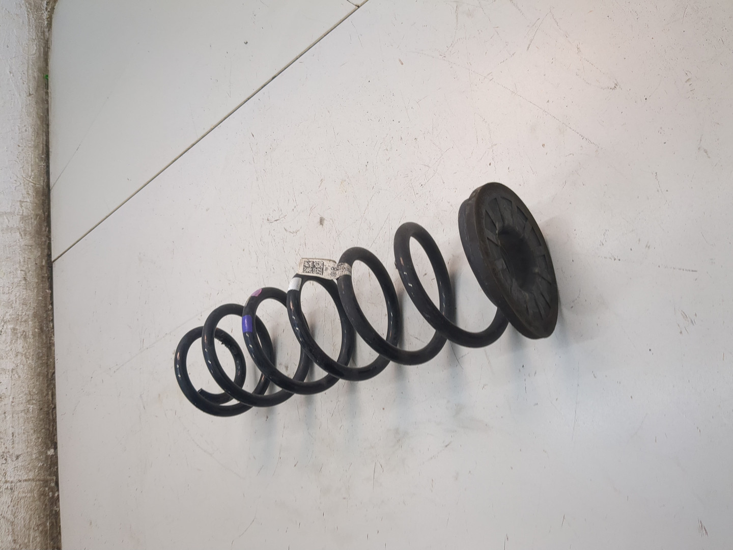 Пружина задняя