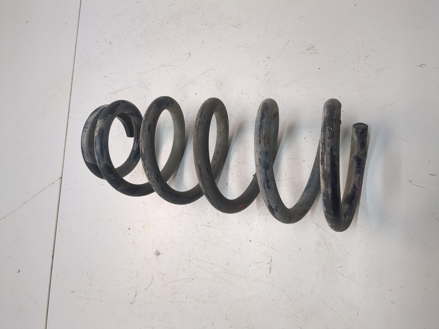 Пружина задняя