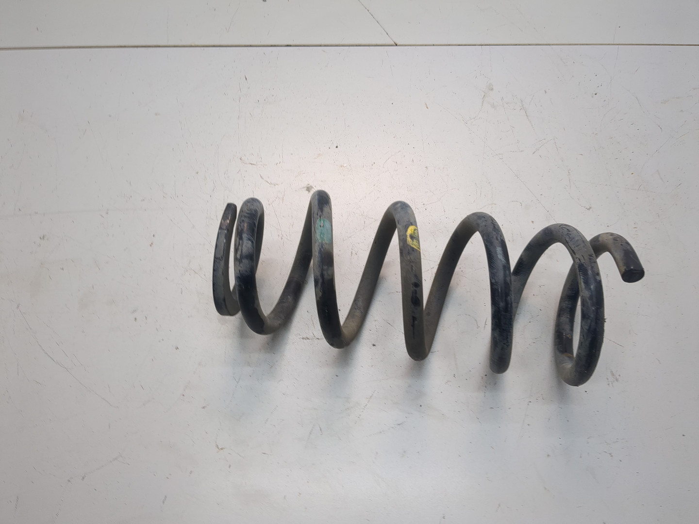 Пружина задняя