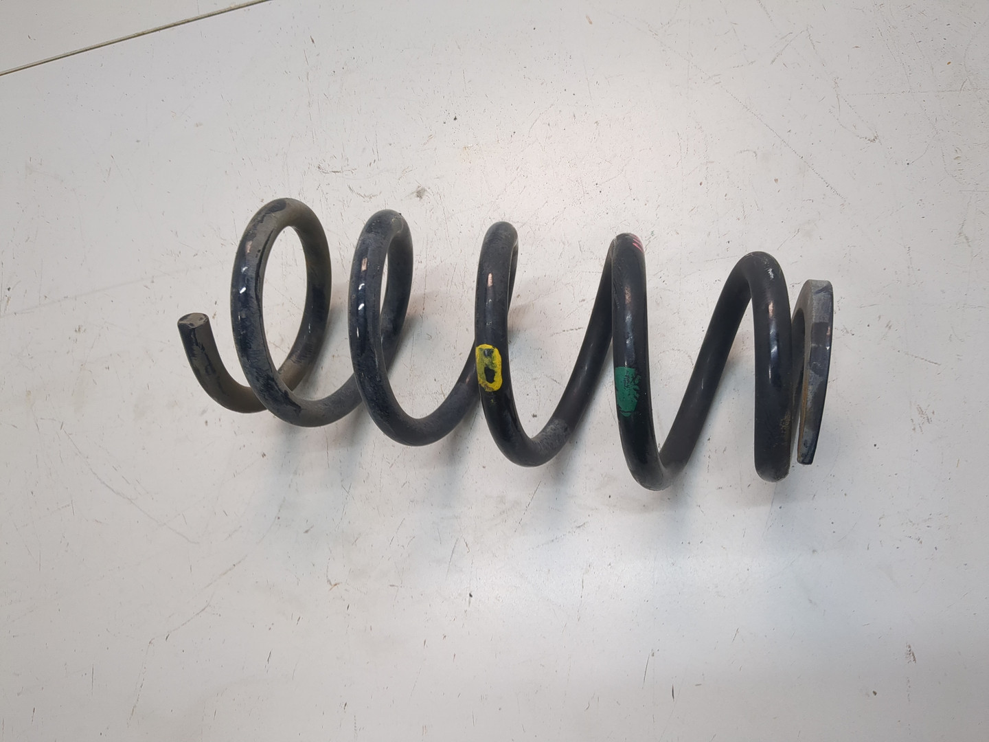 Пружина задняя