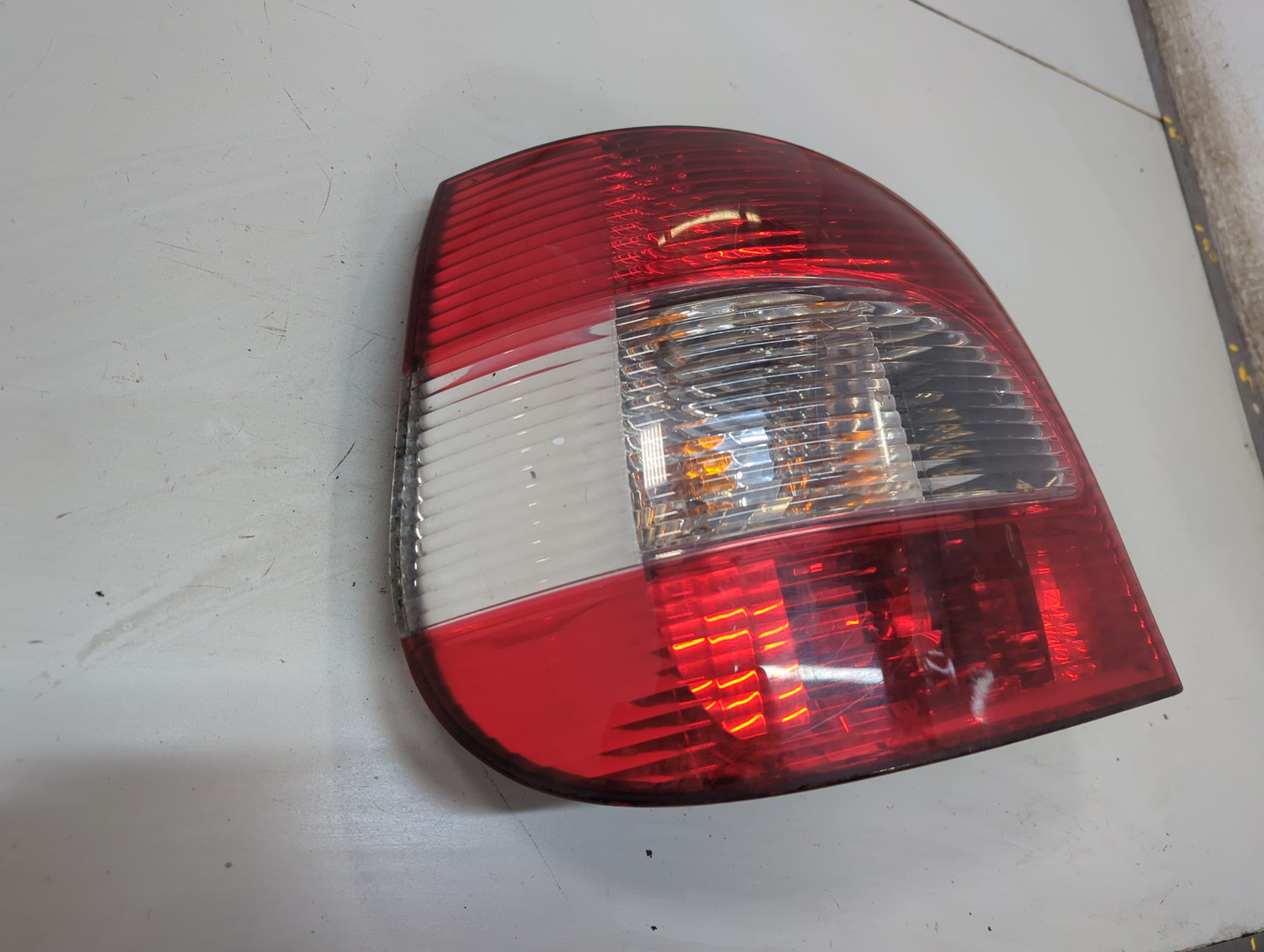 Фонарь задний левый