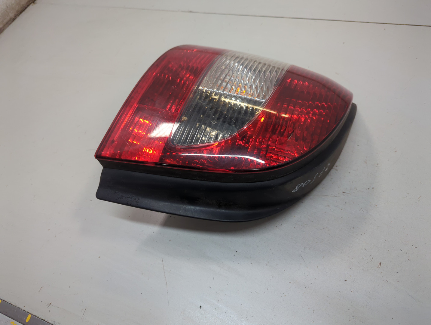 Фонарь задний левый