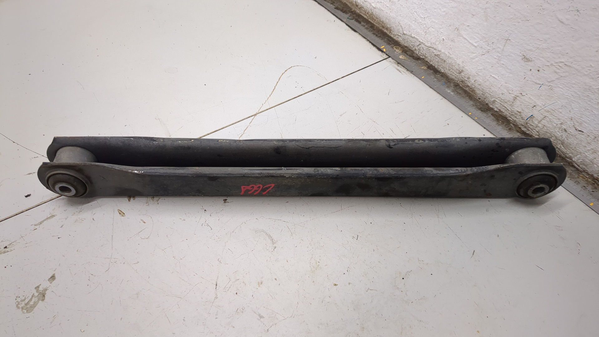 Рычаг задний