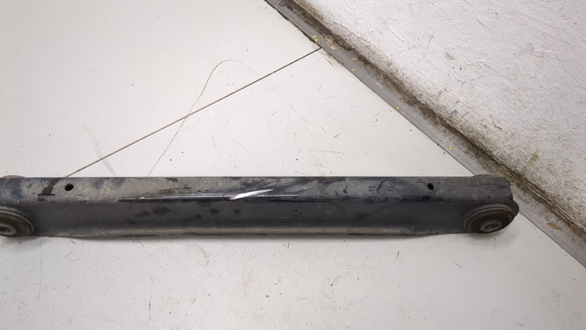 Рычаг задний