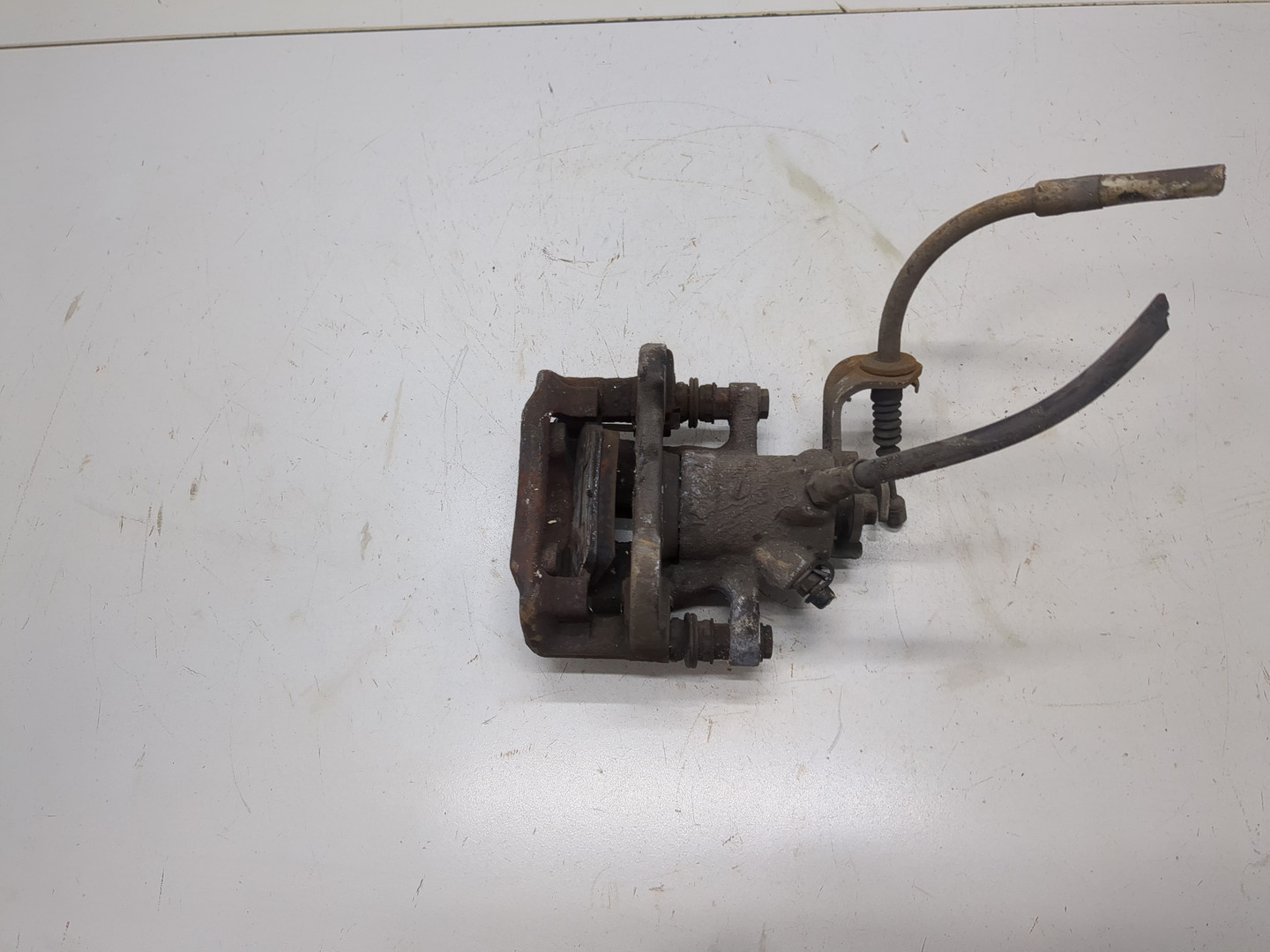 Суппорт задний левый