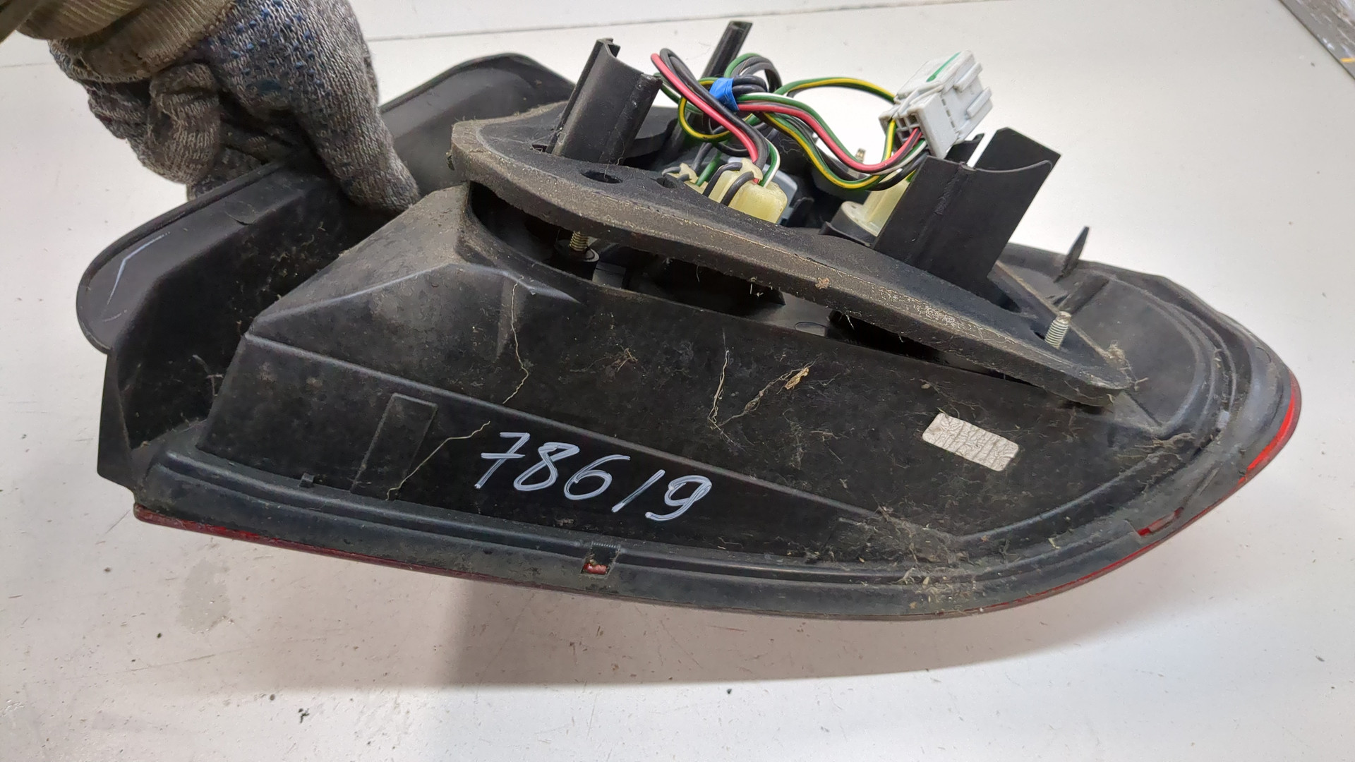 Фонарь задний левый