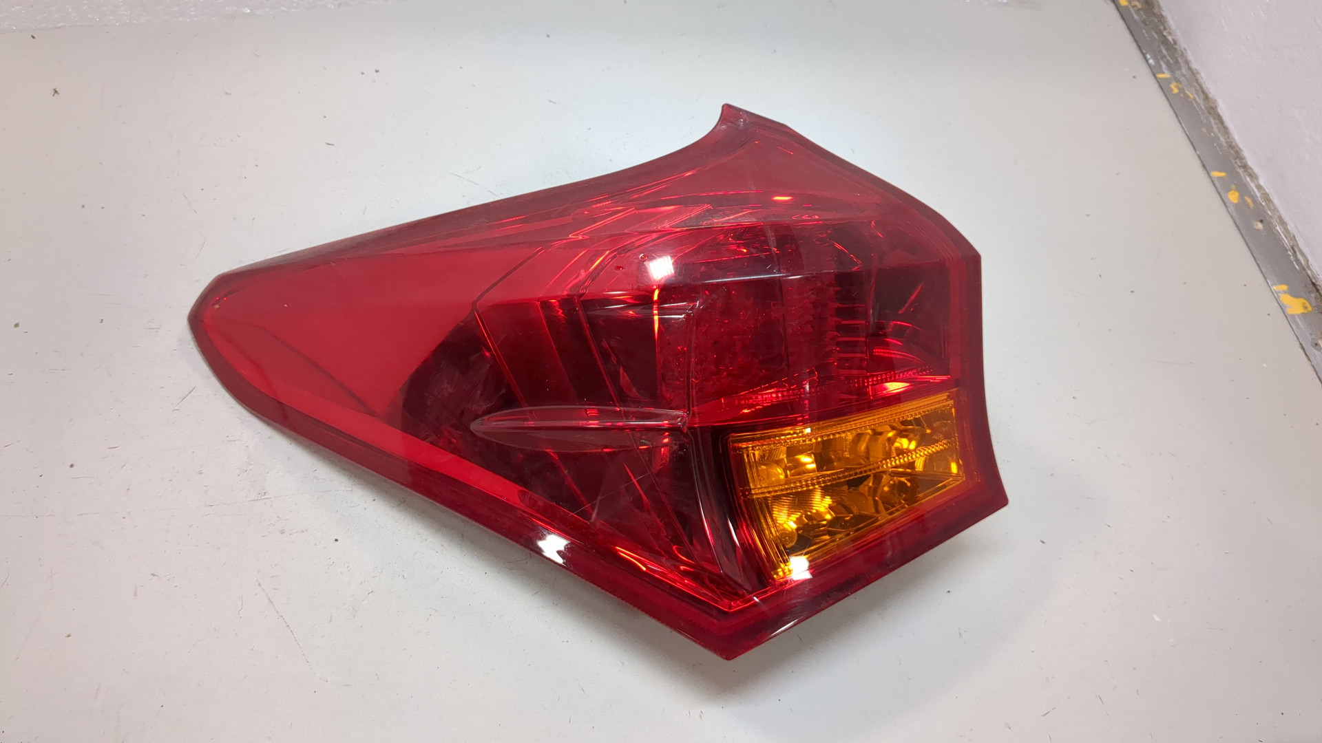 Фонарь задний левый