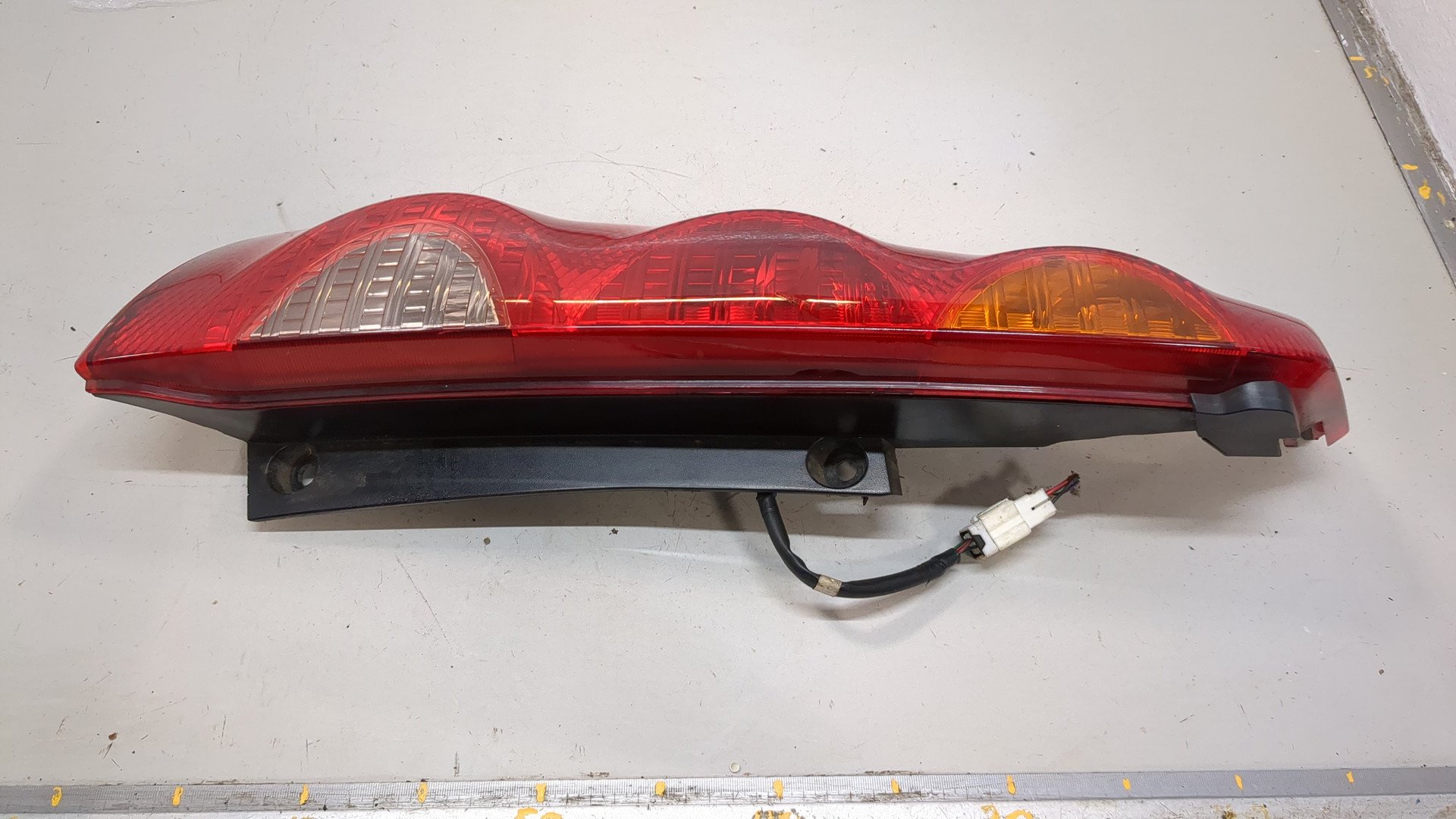 Фонарь задний левый