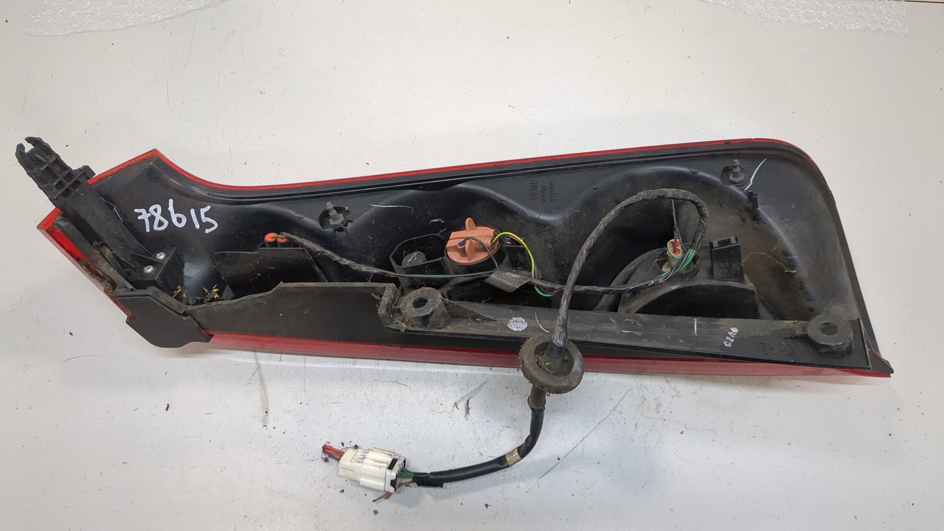 Фонарь задний левый