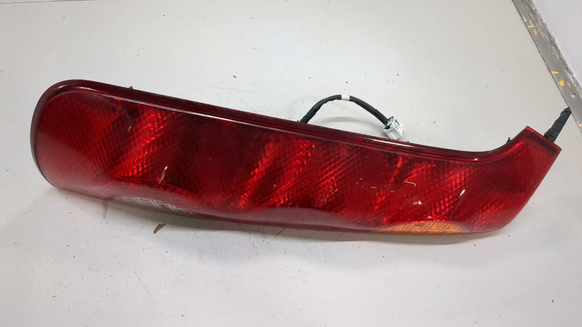 Фонарь задний левый